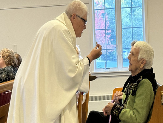 Priest and Deacon at opening prayer
